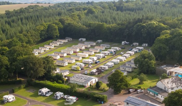 birds eye view over forest glade holiday park in devon