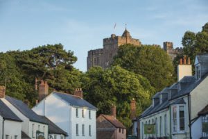 View of Dunster Castle from Dunster village, Somerset