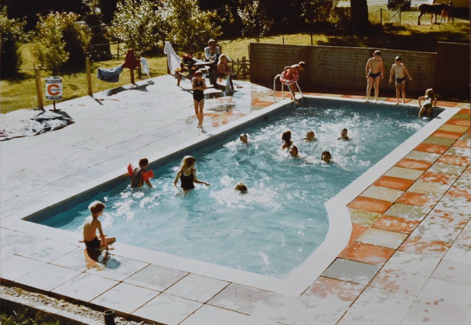children and families playing in swimming pool at Forest Glade