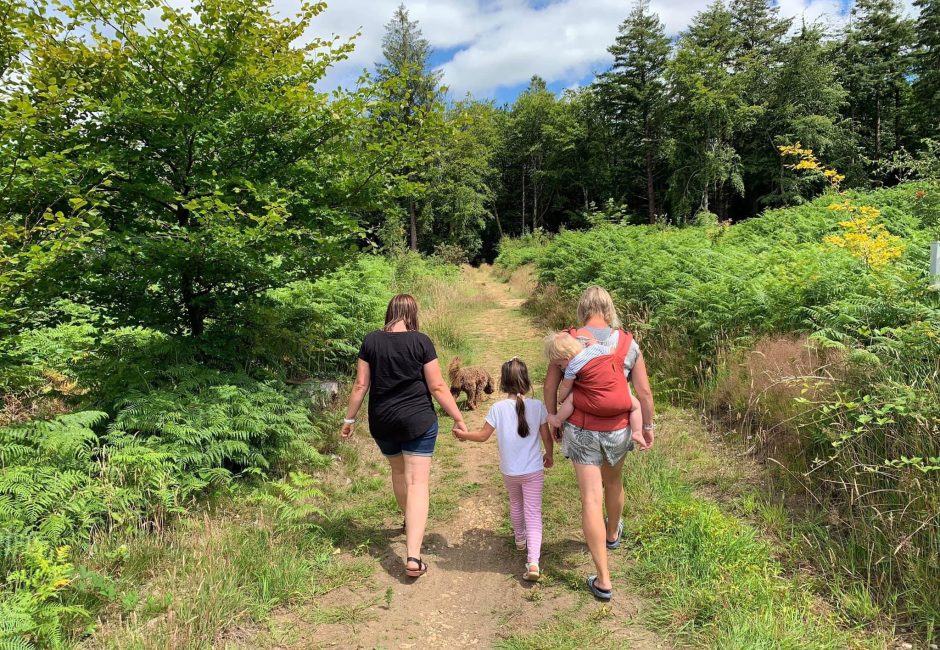 girl walking with family