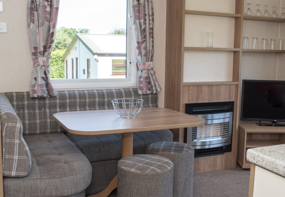 living room at forest glade holiday park culm caravan